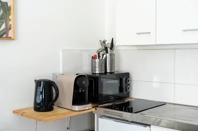 Cuisine ou kitchenette dans l'établissement Appartement dans quartier pittoresque