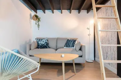 Coin salon dans l'établissement Appartement proche Place Saint-Sauveur