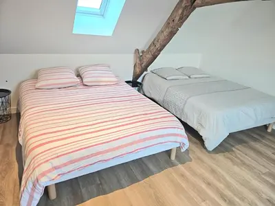 Un ou plusieurs lits dans un hébergement de l'établissement Appartement Granville 5