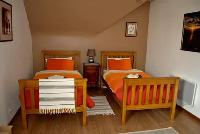 Un ou plusieurs lits dans un hébergement de l'établissement Les Gîtes Champêtres OAK Cottage