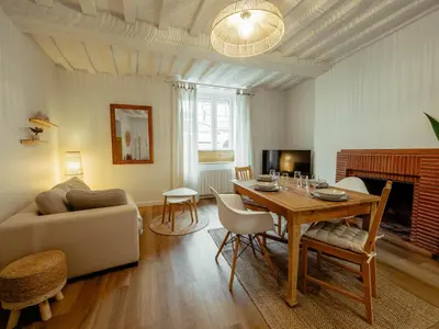 Télévision ou salle de divertissement dans l'établissement Appartement Cosy Cœur de la Normandie