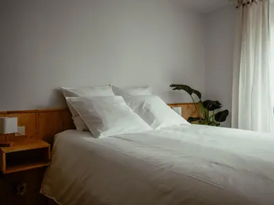 Un ou plusieurs lits dans un hébergement de l'établissement Appartement Cosy Cœur de la Normandie