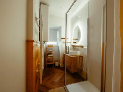 Un ou plusieurs lits dans un hébergement de l'établissement Appartement Cosy Cœur de la Normandie