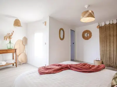 Un ou plusieurs lits dans un hébergement de l'établissement Maison de charme avec jardin à Sallenelles - FR-1-788-51