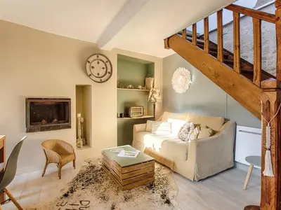 Coin salon dans l'établissement Maison de charme avec jardin à Sallenelles - FR-1-788-51
