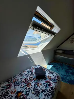 Un ou plusieurs lits dans un hébergement de l'établissement Brèche Marais - Duplex niché en bord de mer
