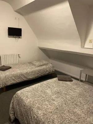 Un ou plusieurs lits dans un hébergement de l'établissement Côté mer