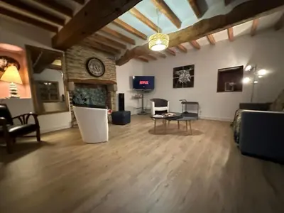 Télévision ou salle de divertissement dans l'établissement Évasion à Hainneville