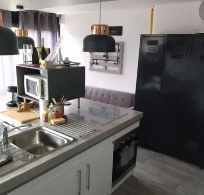 Cuisine ou kitchenette dans l'établissement L'atelier des rêves
