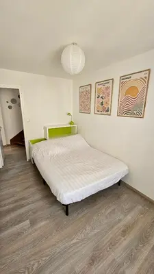 Un ou plusieurs lits dans un hébergement de l'établissement Maison de bourg proche de la mer