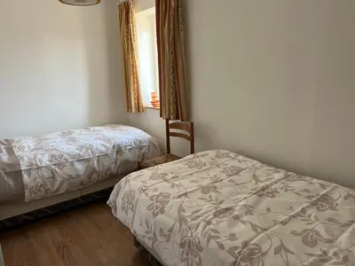Un ou plusieurs lits dans un hébergement de l'établissement Chez Casa Holiday Gite