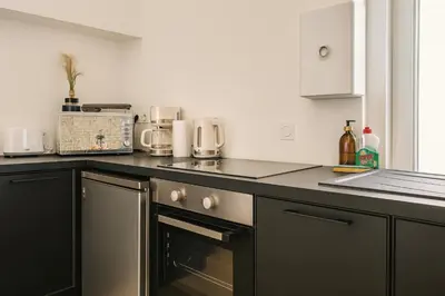 Cuisine ou kitchenette dans l'établissement La Maison d'Alcyone by Melrose
