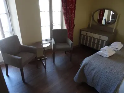 Un ou plusieurs lits dans un hébergement de l'établissement Gite Saint Julien