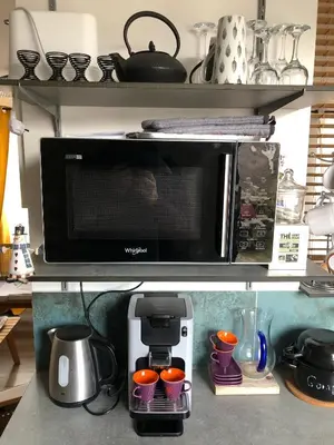 Cuisine ou kitchenette dans l'établissement Sauge et Romarin