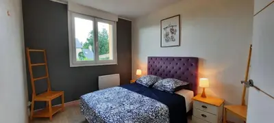 Un ou plusieurs lits dans un hébergement de l'établissement Pavillon individuel plain-pied avec terrasse et parking