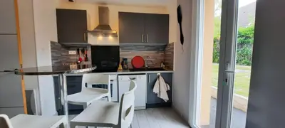 Cuisine ou kitchenette dans l'établissement Pavillon individuel plain-pied avec terrasse et parking