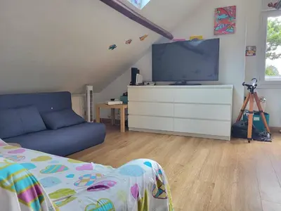 Télévision ou salle de divertissement dans l'établissement Maison familiale 4 chambres près de la plage à Merville-Franceville-Plage - FR-1-788-52