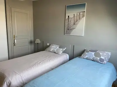 Un ou plusieurs lits dans un hébergement de l'établissement Magnifique appartement à 100 m de la plage