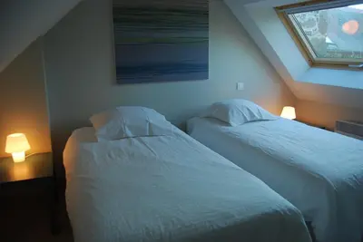 Un ou plusieurs lits dans un hébergement de l'établissement Maison de pêcheur à 1,5km de la mer