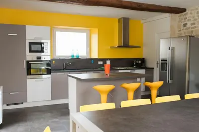 Cuisine ou kitchenette dans l'établissement le coq