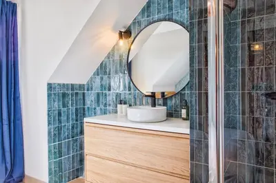 Salle de bains dans l'établissement Logement Cozy décoré avec gout