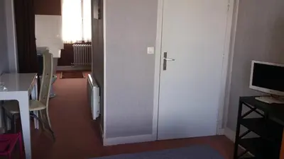 Télévision ou salle de divertissement dans l'établissement Hotel Moderne