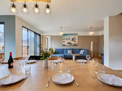 Coin salon dans l'établissement Holiday Home L'Aventure Gouvillaise by Interhome