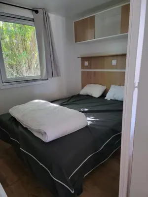Un ou plusieurs lits dans un hébergement de l'établissement Mobil Home Calina 4-6 personnes