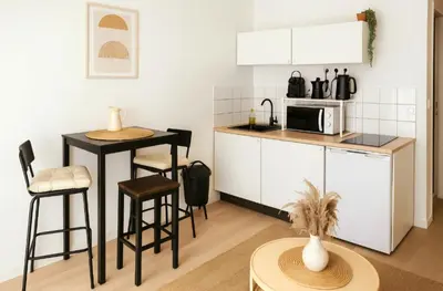 Cuisine ou kitchenette dans l'établissement Charmant Studio Vie Caennaise au Port & Vaugueux