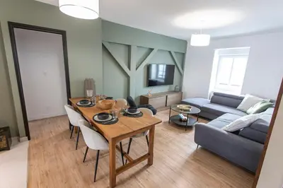 Coin salon dans l'établissement Appartement historique Dior