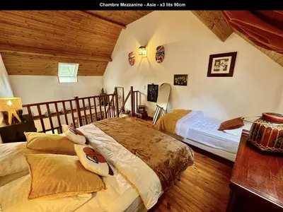 Un ou plusieurs lits dans un hébergement de l'établissement La Clef Decamp Chevaux d'Asie 22 pers jacuzzi billard baby foot