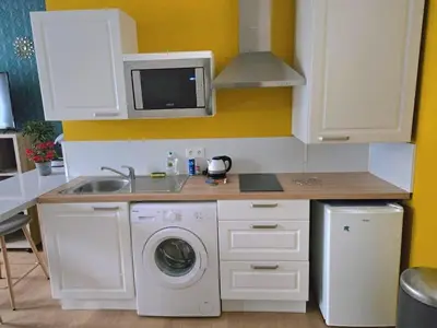 Cuisine ou kitchenette dans l'établissement Studio du Pont Tournant