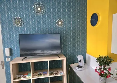 Télévision ou salle de divertissement dans l'établissement Studio du Pont Tournant