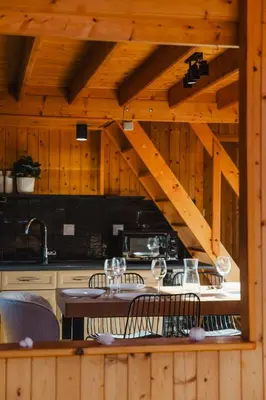 Cuisine ou kitchenette dans l'établissement Chalet cosy - Proche mer