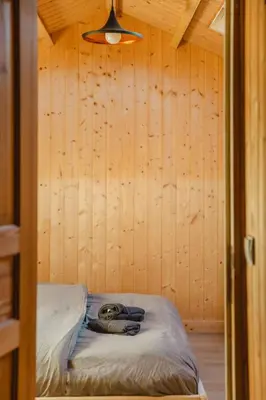 Un ou plusieurs lits dans un hébergement de l'établissement Chalet cosy - Proche mer