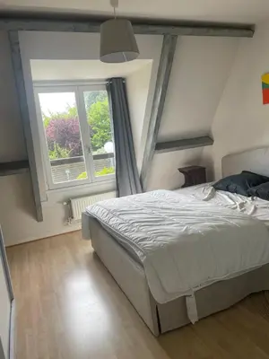 Un ou plusieurs lits dans un hébergement de l'établissement Cottage with Garden 5mn Beach