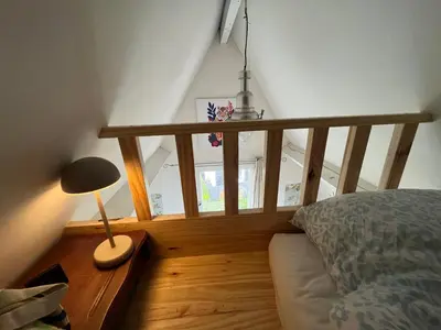 Un ou plusieurs lits dans un hébergement de l'établissement Cottage with Garden 5mn Beach