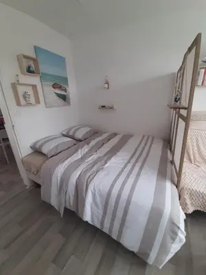 Un ou plusieurs lits dans un hébergement de l'établissement Appartement 2 pieces