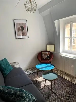 Coin salon dans l'établissement Appartement Coeur historique de Bayeux