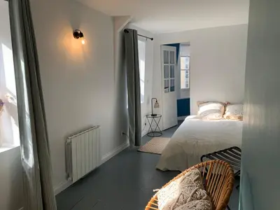 Un ou plusieurs lits dans un hébergement de l'établissement Appartement Coeur historique de Bayeux
