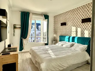Un ou plusieurs lits dans un hébergement de l'établissement joli T2 situé dans le coeur de Cabourg
