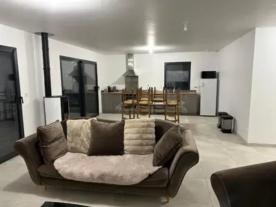 Coin salon dans l'établissement Les Lavandières