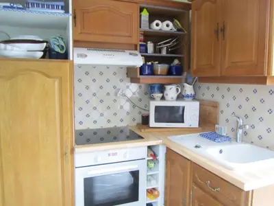 Cuisine ou kitchenette dans l'établissement Maison Familiale Proche mer