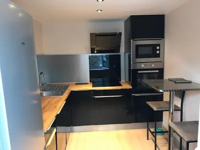 Cuisine ou kitchenette dans l'établissement Mer et Bocage