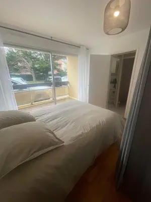 Un ou plusieurs lits dans un hébergement de l'établissement Appartement face au port