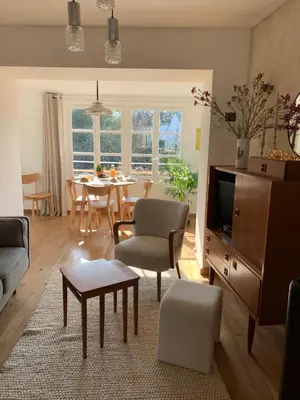 Coin salon dans l'établissement Charmante maison du vieux Coutainville, à 15mn à pied de la mer, classée 3 étoiles
