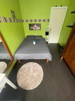 Un ou plusieurs lits dans un hébergement de l'établissement Appartement proche du centre - 58 m2