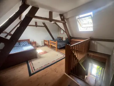 Un ou plusieurs lits dans un hébergement de l'établissement Gîte 1 Château Bellenau
