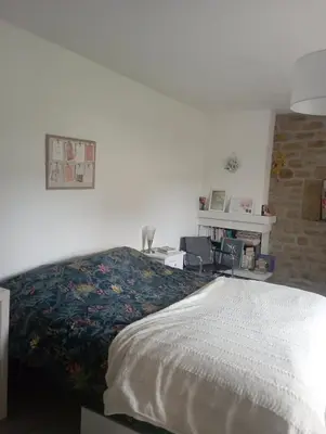 Un ou plusieurs lits dans un hébergement de l'établissement Chambre chez l'habitant
