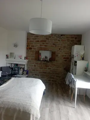 Un ou plusieurs lits dans un hébergement de l'établissement Chambre chez l'habitant